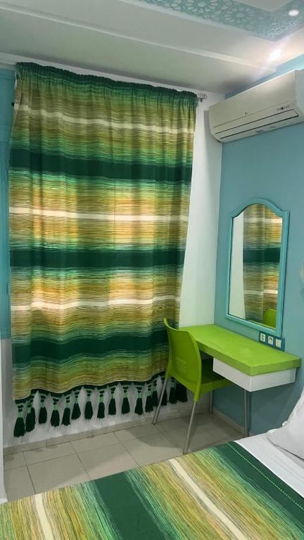 Postel nebo postele na pokoji v ubytování Hôtel Etoile de Mer
