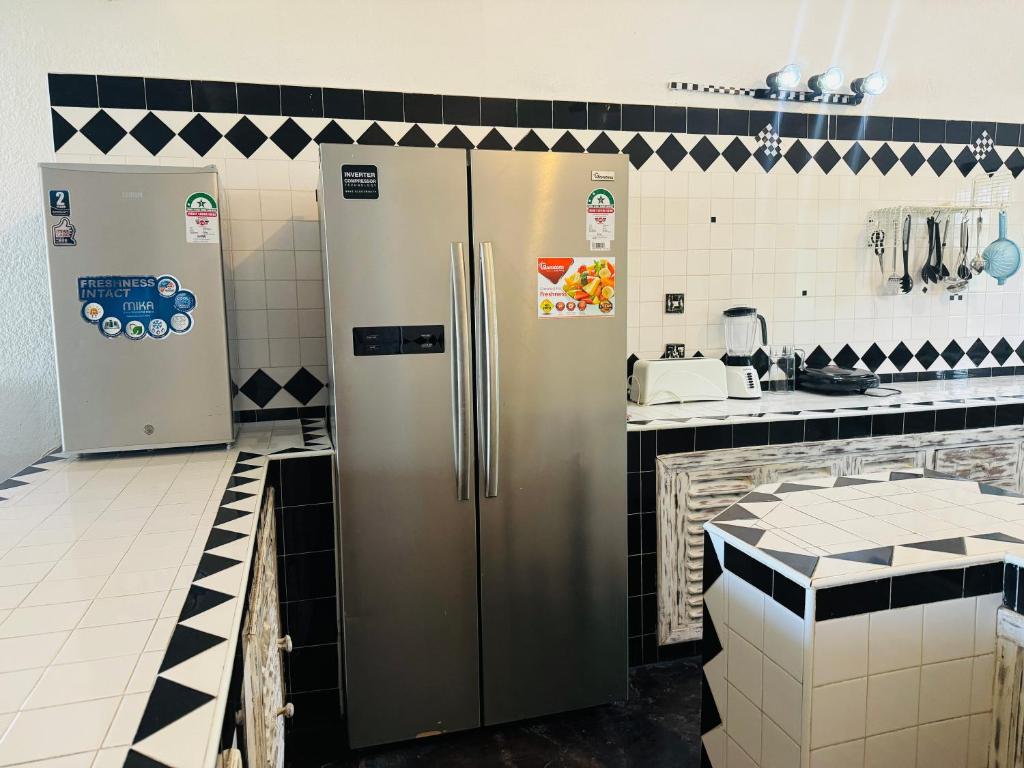 Kuchyň nebo kuchyňský kout v ubytování Watamu Villaggio