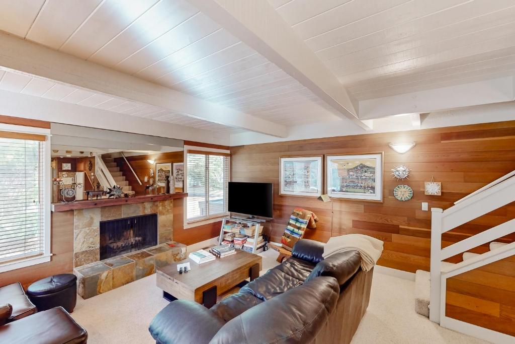 a living room with a couch and a fireplace at Sun Valley Escape in Sun Valley