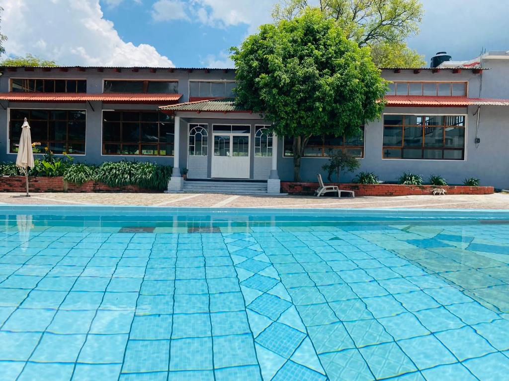 Bazén v ubytování HOTEL EX HACIENDA EL MOLINO nebo v jeho okolí