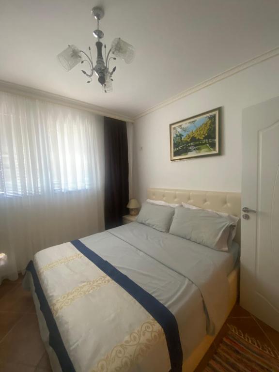 Ліжко або ліжка в номері Albi Apartmet beachfront in Shengjin