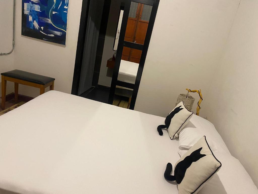 Postel nebo postele na pokoji v ubytování Hostal Patio del Río
