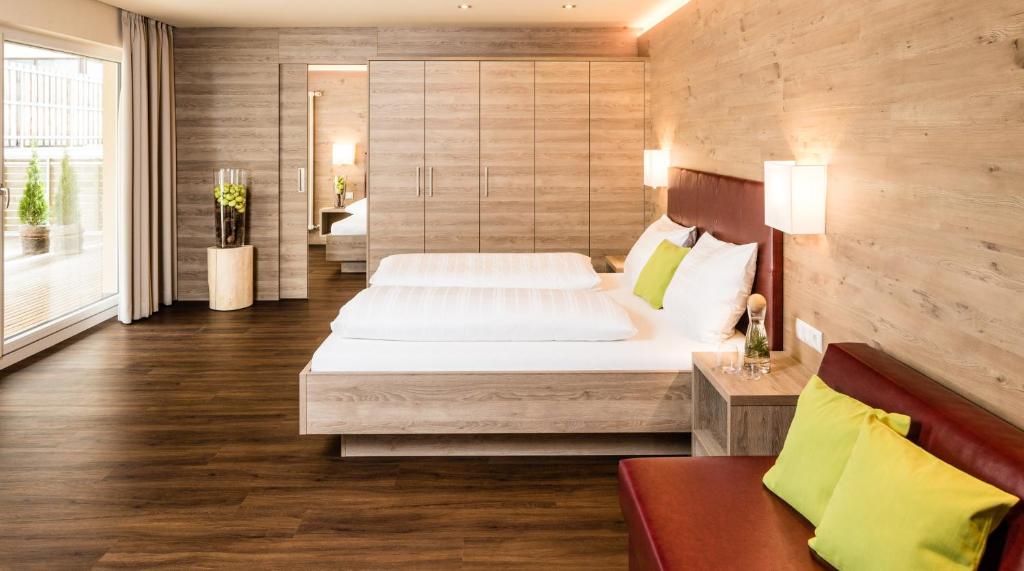 Postel nebo postele na pokoji v ubytování Aktiv Hotel Edelweiss