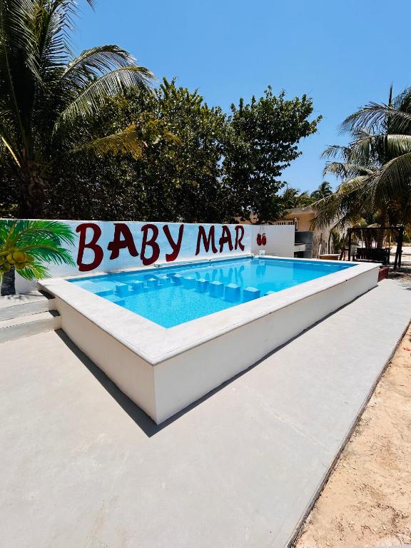 Bazén v ubytování Babymar departamentos a 2 cuadras de la playa. nebo v jeho okolí