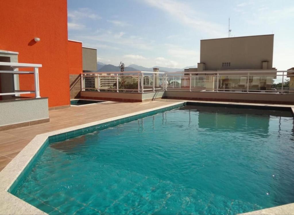 Bazén v ubytování Apartamento Ubatuba, Itagua, Condominio Edificio Villa Monreale, E-12 nebo v jeho okolí