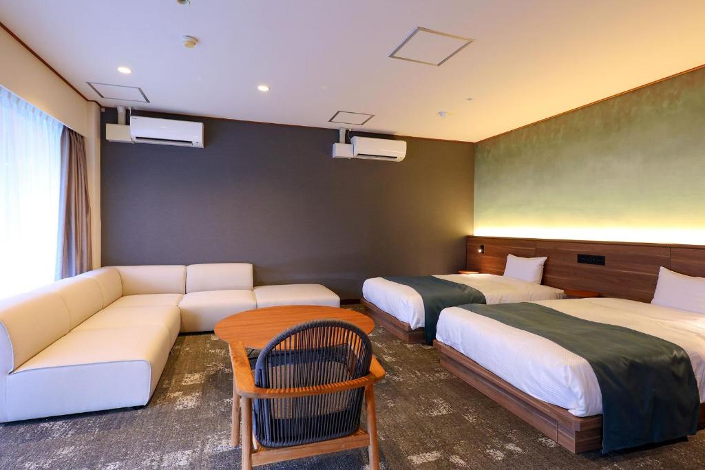 Postel nebo postele na pokoji v ubytování Ooedo Onsen Monogatari Premium Kinugawa Kanko Hotel