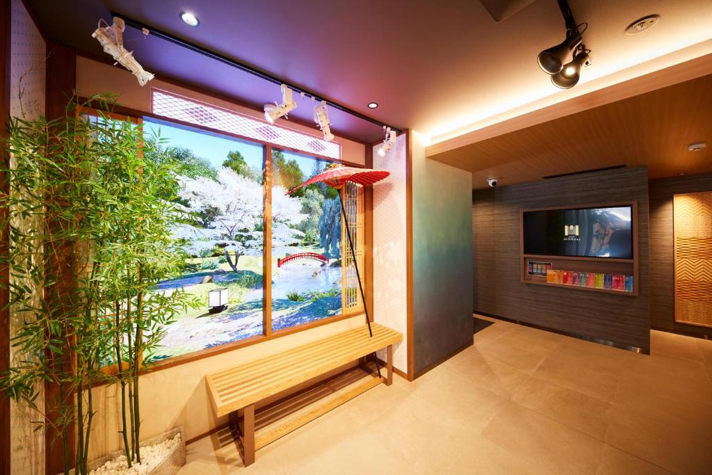 Postel nebo postele na pokoji v ubytování MONday Apart Premium Asakusa
