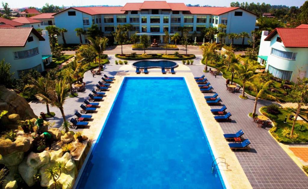 an aerial view of the pool at the resort at EG Paradise Angkor Villa Hotel in Siem Reap