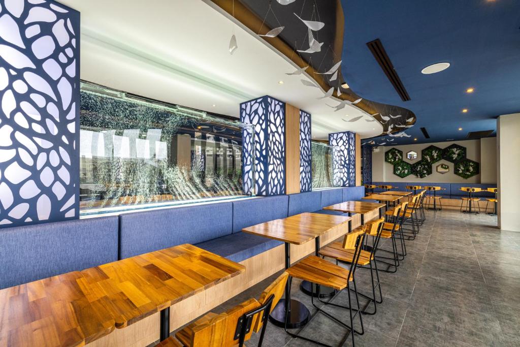 Restaurace v ubytování Kana Triple L Hotel Phuket普吉岛卡娜3L酒店