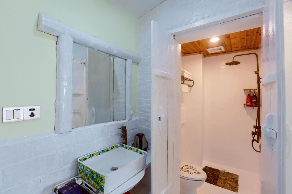Koupelna v ubytování Zhoujia Hostel