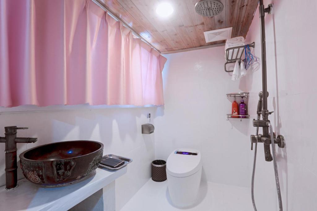 Koupelna v ubytování Zhoujia Hostel