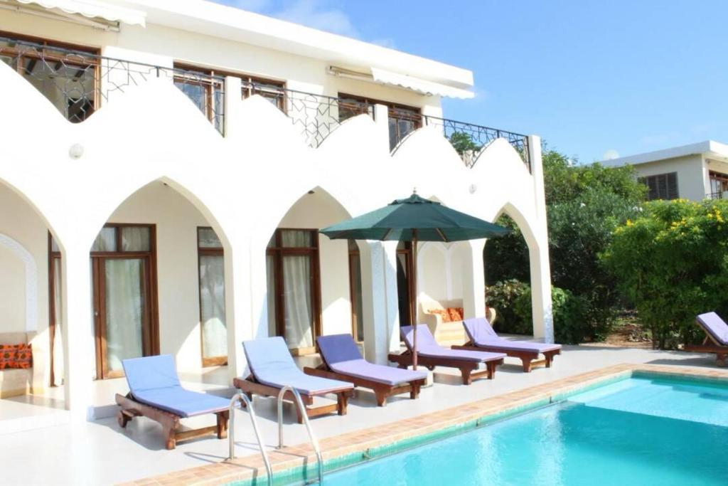 Bazén v ubytování Villa Serenity, Tanzania Unforgettable nebo v jeho okolí