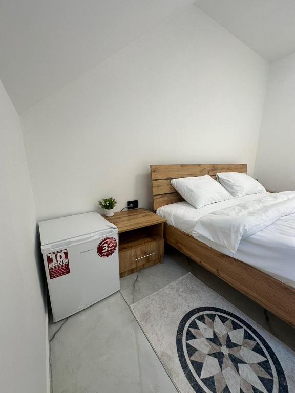 Postel nebo postele na pokoji v ubytování M-23 Hotel