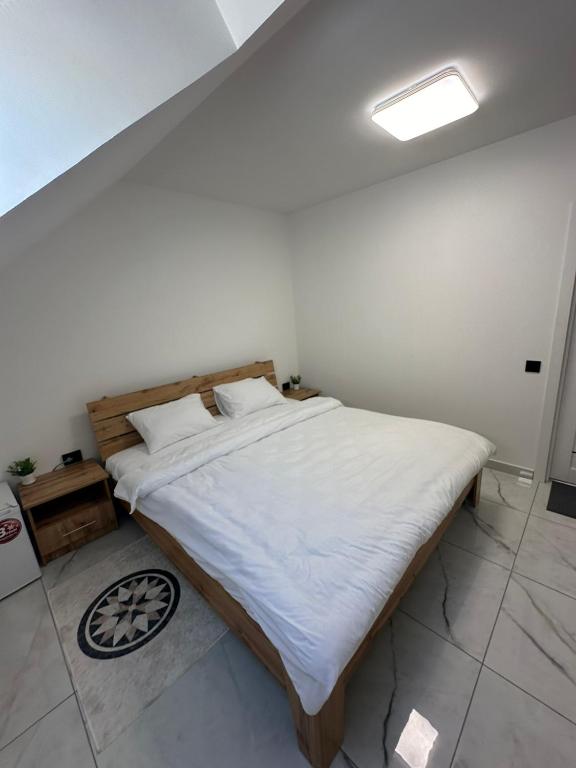 Postel nebo postele na pokoji v ubytování M-23 Hotel