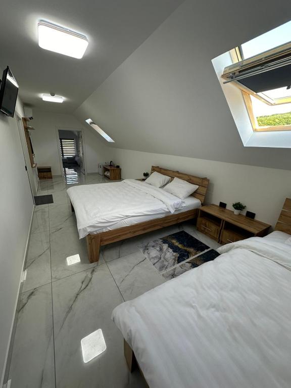 Postel nebo postele na pokoji v ubytování M-23 Hotel