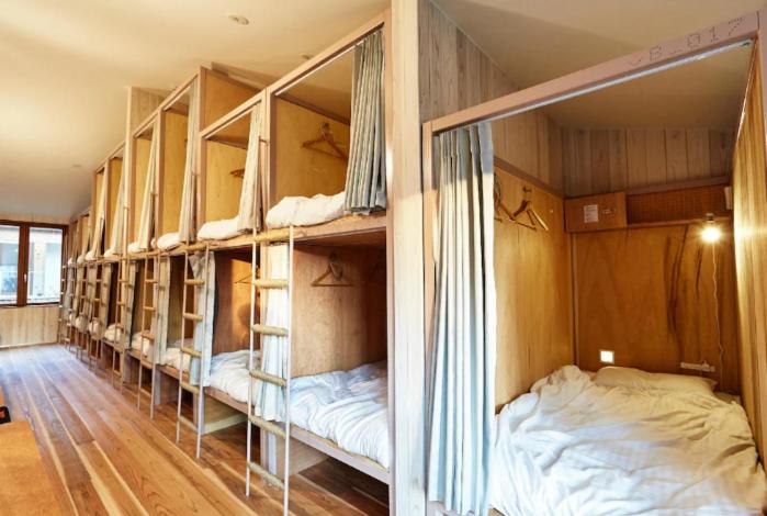 Voodi või voodid majutusasutuse WGJ Hostel toas