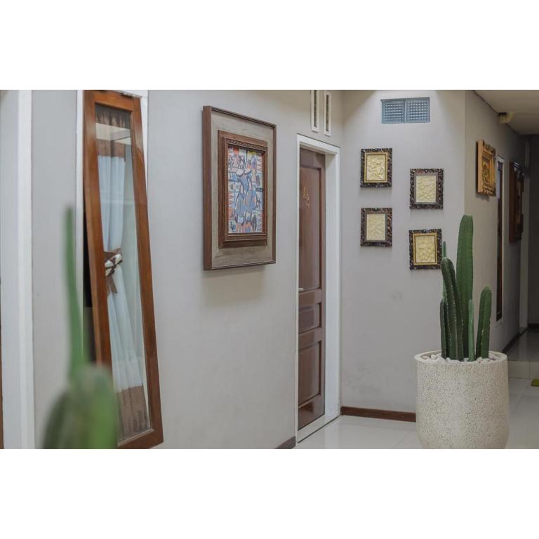 Fotografie z fotogalerie ubytování Reddoorz Syariah at House Of Melati Kepanjen v destinaci Malang