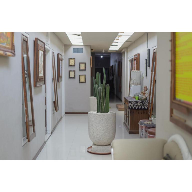 Fotografie z fotogalerie ubytování Reddoorz Syariah at House Of Melati Kepanjen v destinaci Malang