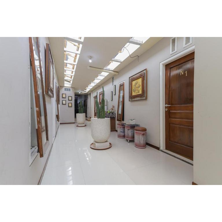 Fotografie z fotogalerie ubytování Reddoorz Syariah at House Of Melati Kepanjen v destinaci Malang