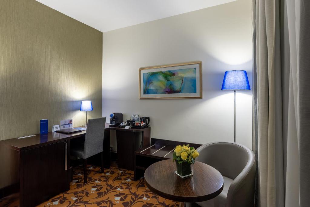 Babylon Rotana Hotelにあるテレビまたはエンターテインメントセンター