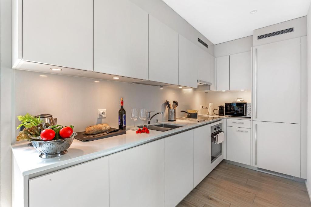 Kuchyň nebo kuchyňský kout v ubytování Melano Lab Park Apartments