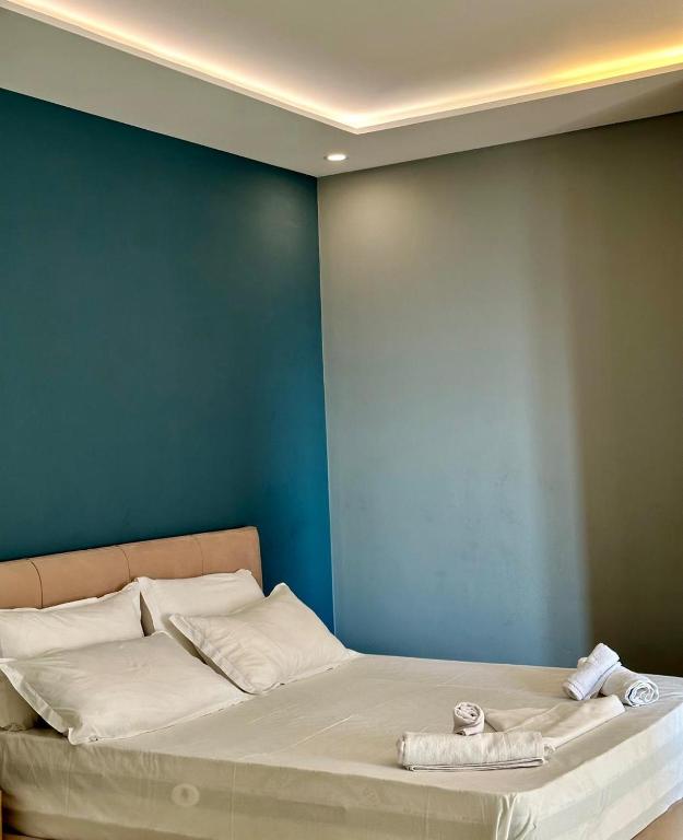 Postel nebo postele na pokoji v ubytování Zeus Hotel