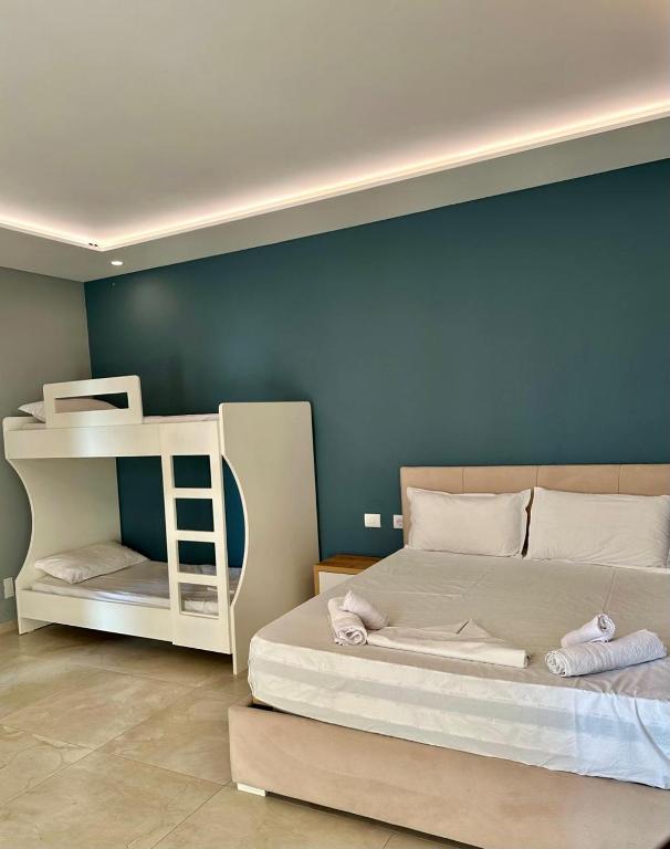 Postel nebo postele na pokoji v ubytování Zeus Hotel