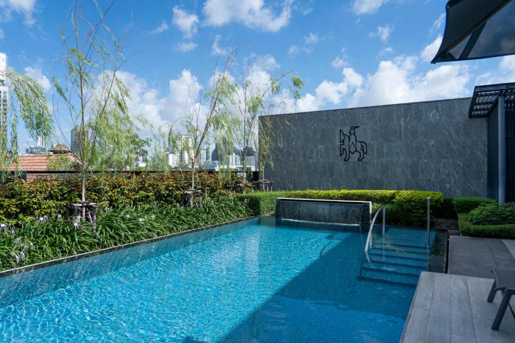 Bazén v ubytování Walton Suites Sukhumvit nebo v jeho okolí