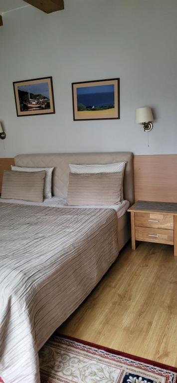 Postel nebo postele na pokoji v ubytování Molas svečių namai