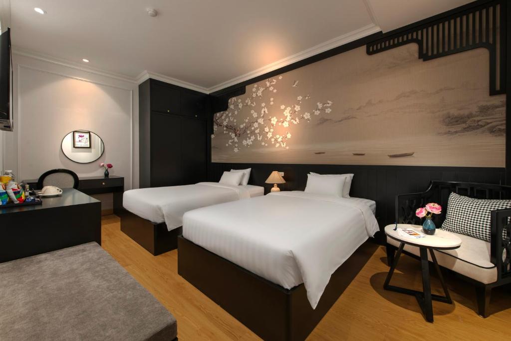 Postel nebo postele na pokoji v ubytování San Premium Hotel