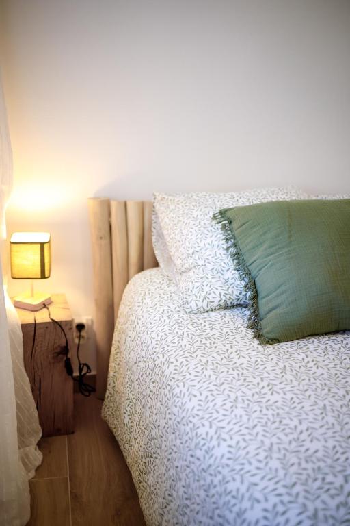 Postel nebo postele na pokoji v ubytování Maisonnette vue mer au Pradet