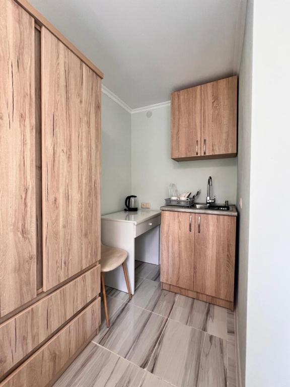 Kuchyň nebo kuchyňský kout v ubytování Cozy Haven