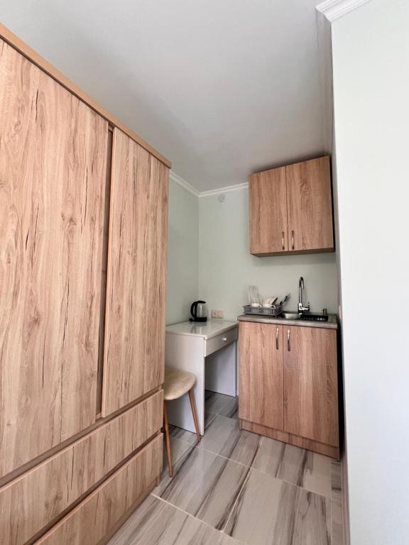 Kuchyň nebo kuchyňský kout v ubytování Cozy Haven