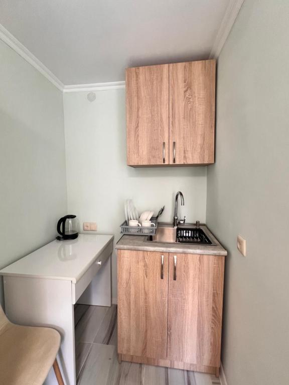 Kuchyň nebo kuchyňský kout v ubytování Cozy Haven