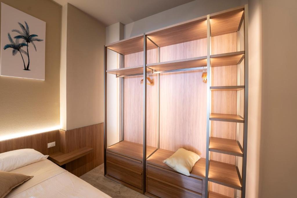 Postel nebo postele na pokoji v ubytování Lampada di Aladino