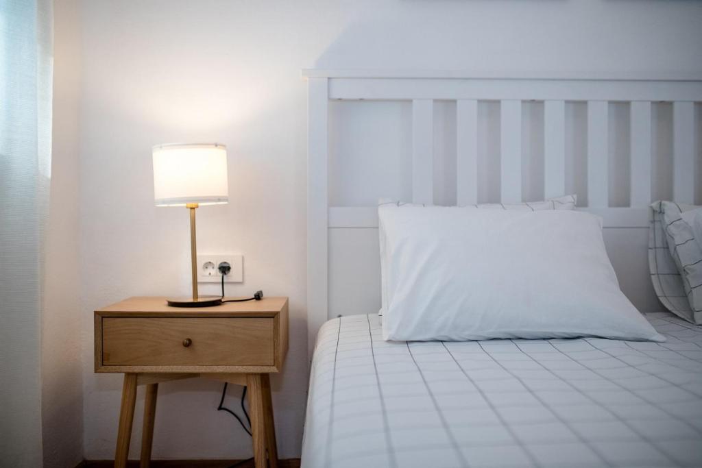 Кровать или кровати в номере Apartmet Jadran