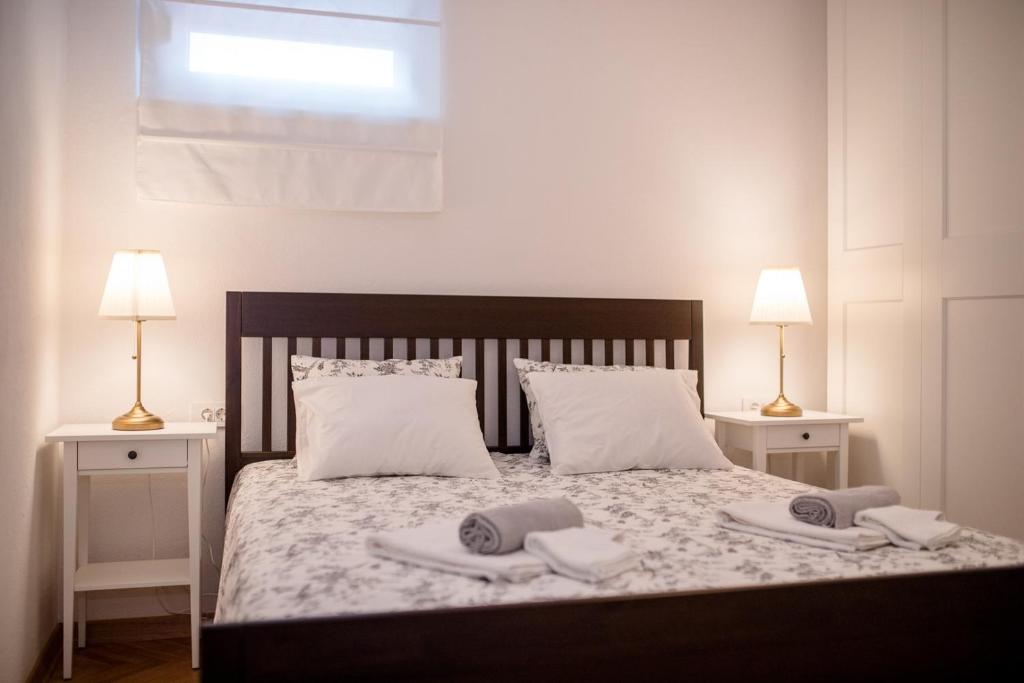 Кровать или кровати в номере Apartmet Jadran