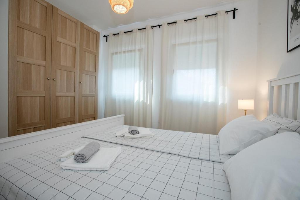 Кровать или кровати в номере Apartmet Jadran