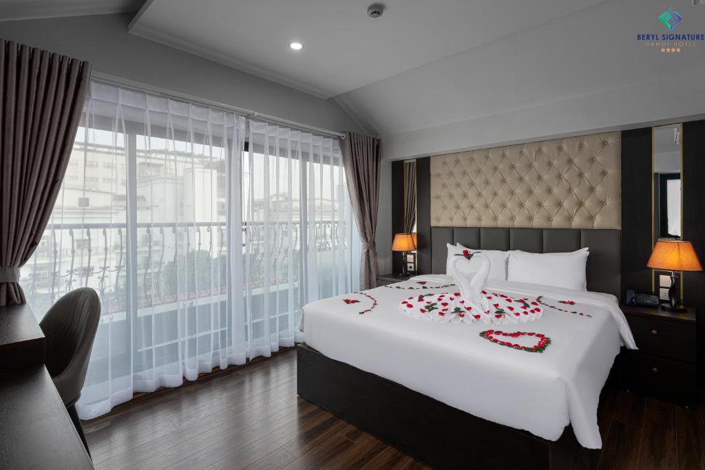 Postel nebo postele na pokoji v ubytování Beryl Signature Hotel & Travel