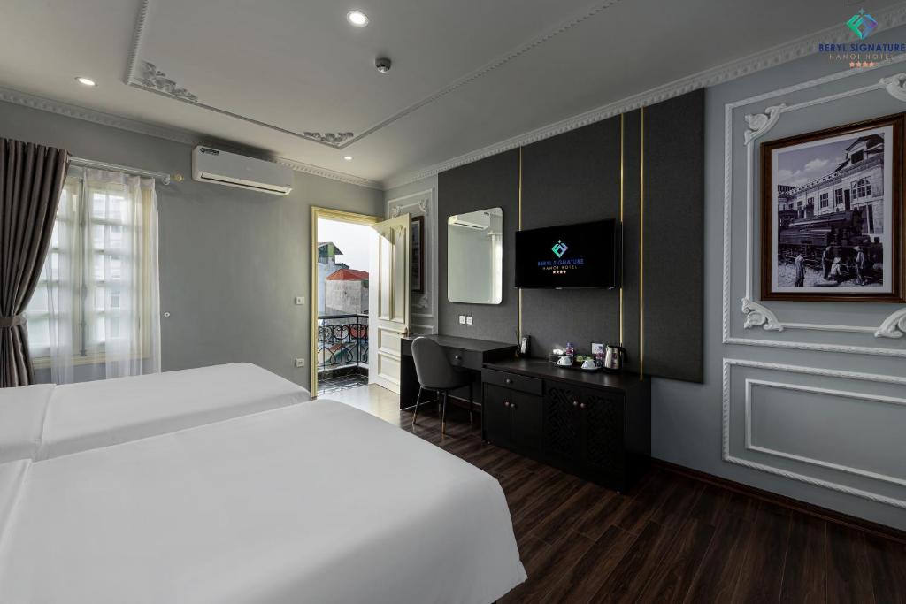 Postel nebo postele na pokoji v ubytování Beryl Signature Hotel & Travel
