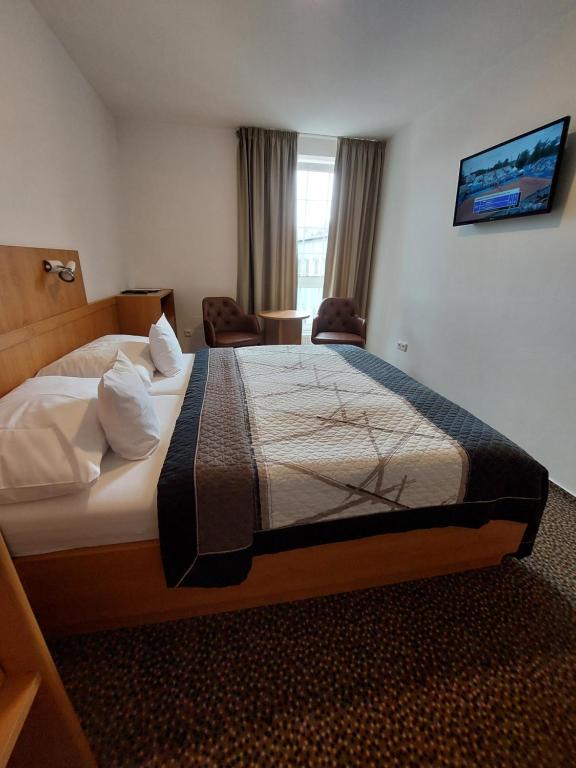 Postel nebo postele na pokoji v ubytování Hotel Avion