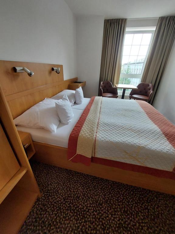 Postel nebo postele na pokoji v ubytování Hotel Avion