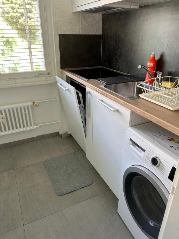 Kuchyň nebo kuchyňský kout v ubytování HANNA Apartment