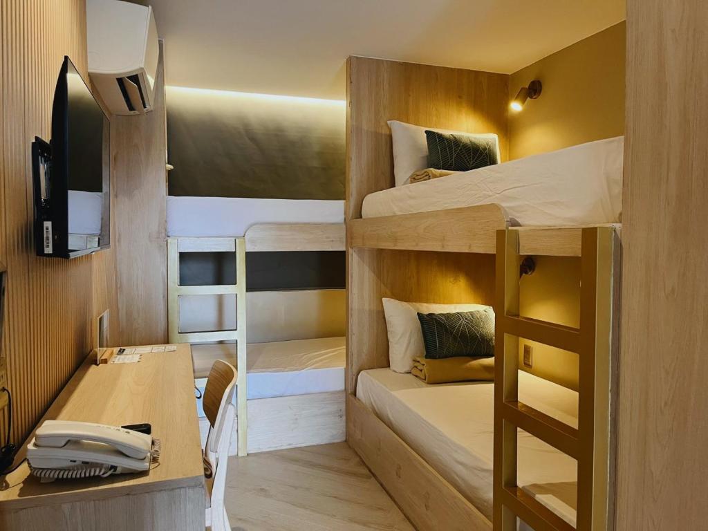 Postel nebo postele na pokoji v ubytování Xen By Balai Norte