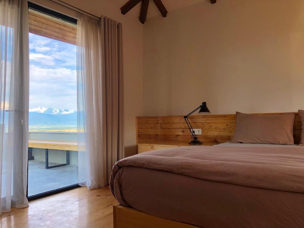 Postel nebo postele na pokoji v ubytování Lokokina Guesthouse