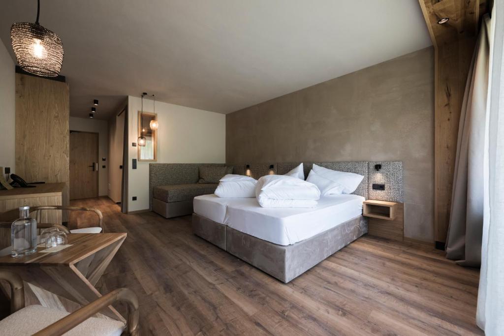 Postel nebo postele na pokoji v ubytování Hotel Patris