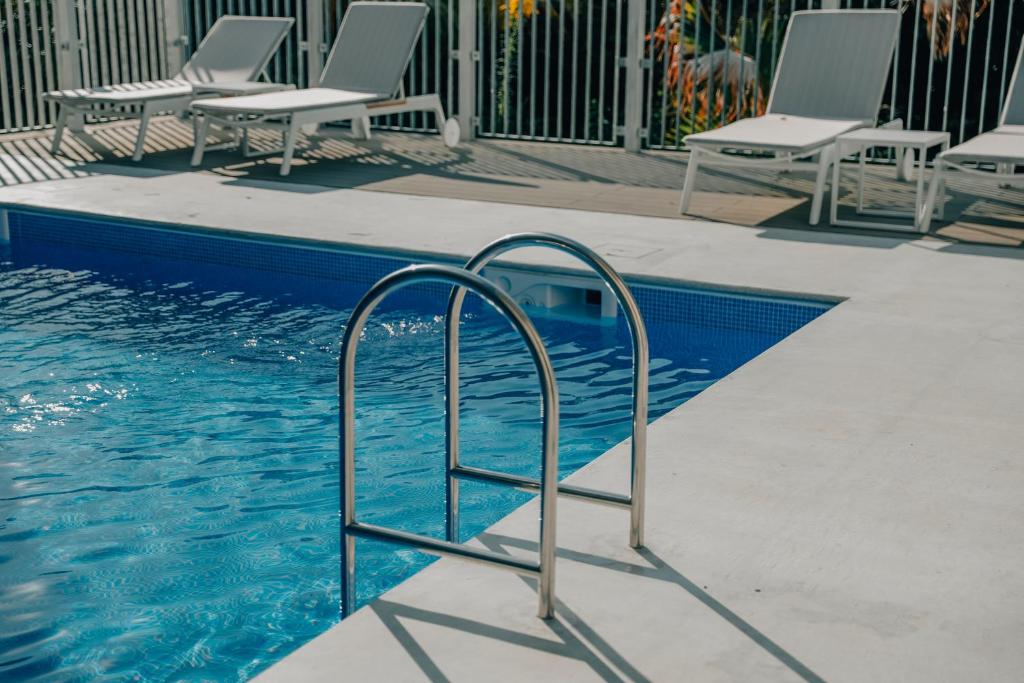 Bazén v ubytování BOTANICAL POOL CLUB nebo v jeho okolí