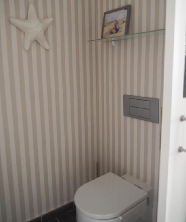 Koupelna v ubytování Apartamento frente al mar en la mejor ubicación de Calella