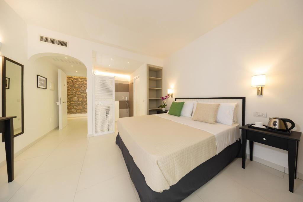 Postel nebo postele na pokoji v ubytování Casa Giuliani Capri