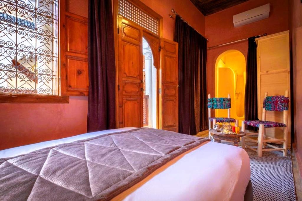 Postel nebo postele na pokoji v ubytování Riad Vilamoura & SPA